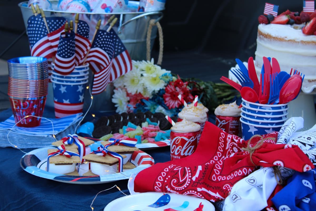 Patriotic Fourth of July table with food and American flags